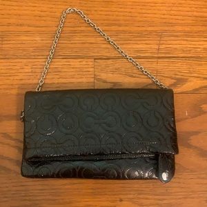 coach black patent leather clutch